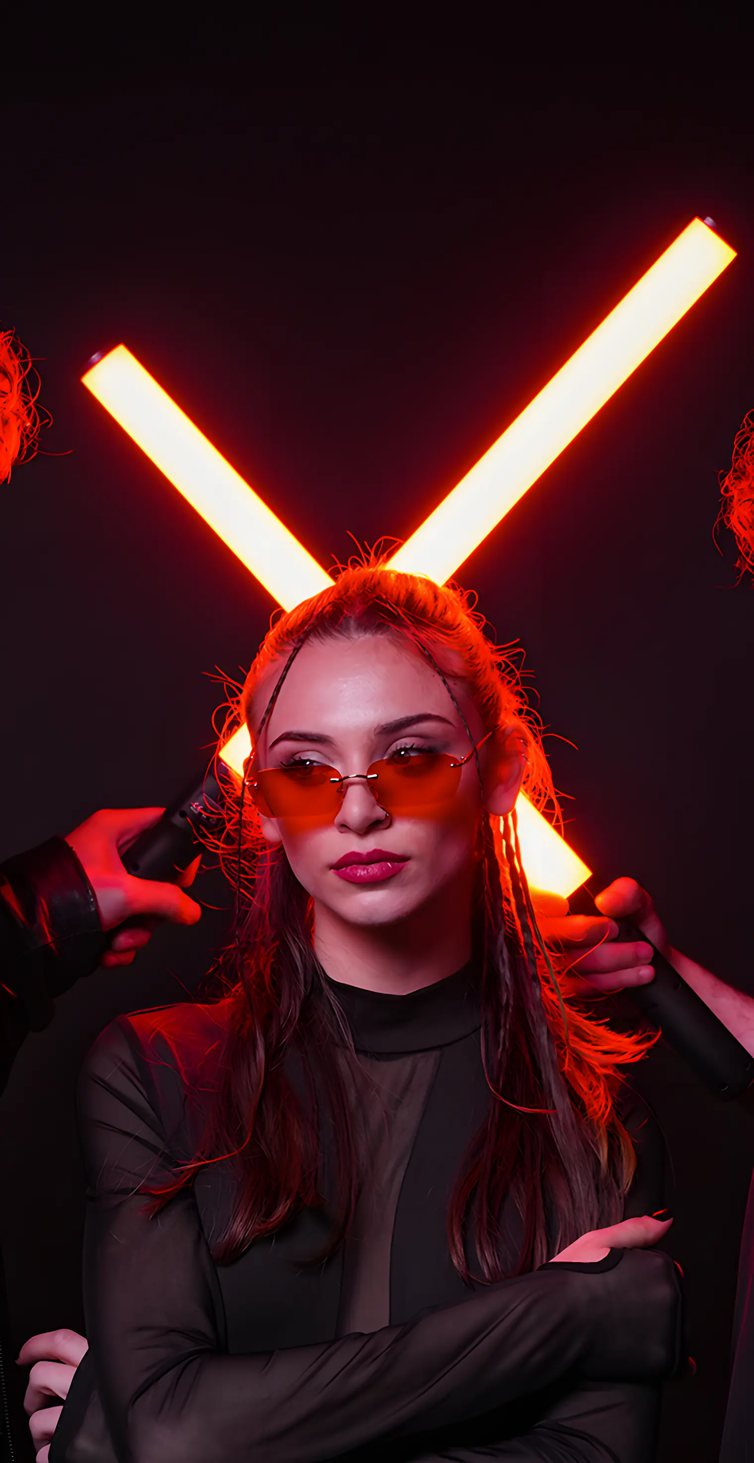 A model wearing VICE sunglasses in Red